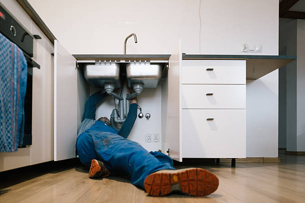 Professional Drain Cleaning technician working in Scottville, MI